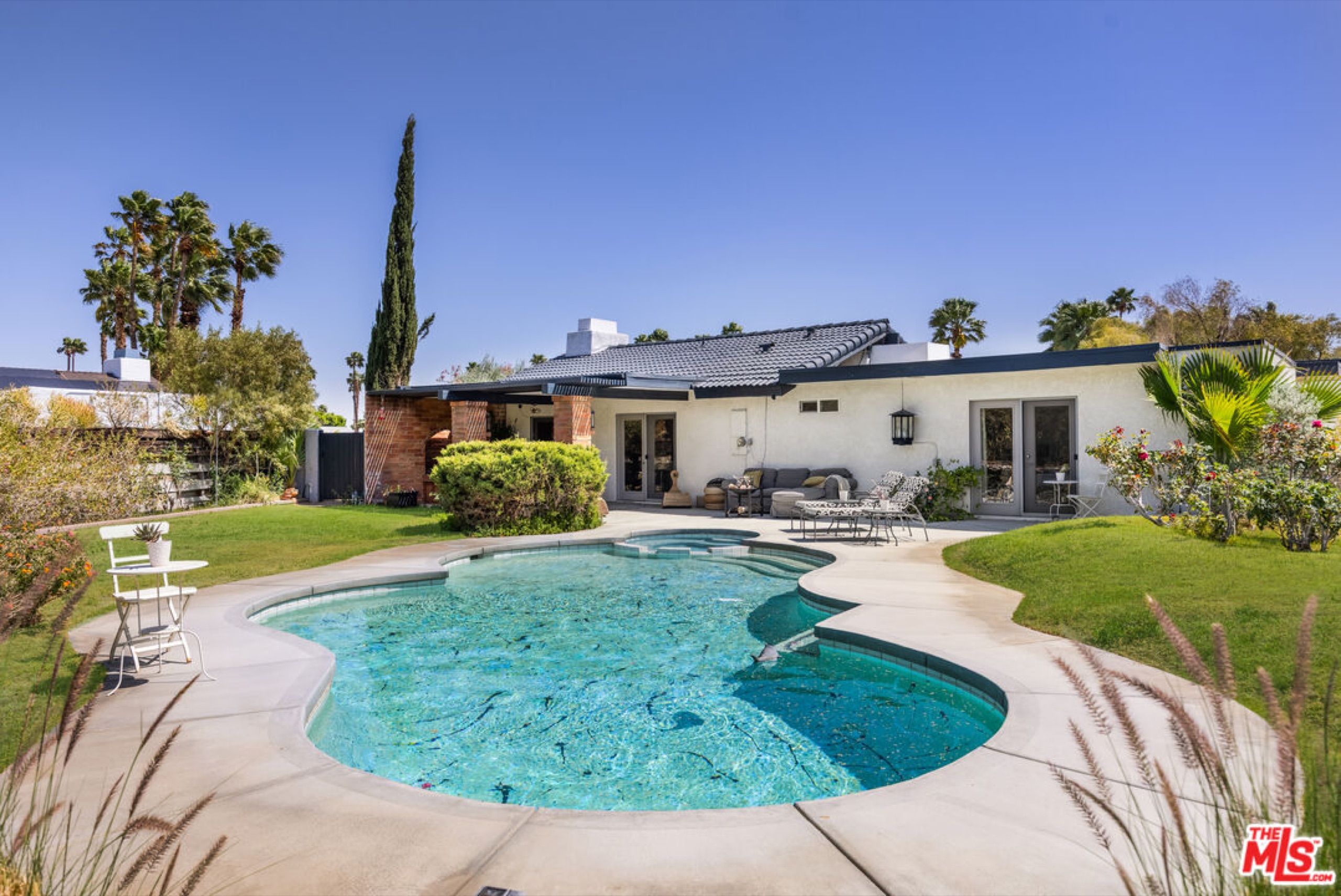 Pool and garden at the Hugh Kaptur designed home at 772 East El Conquistador, Palm Springs