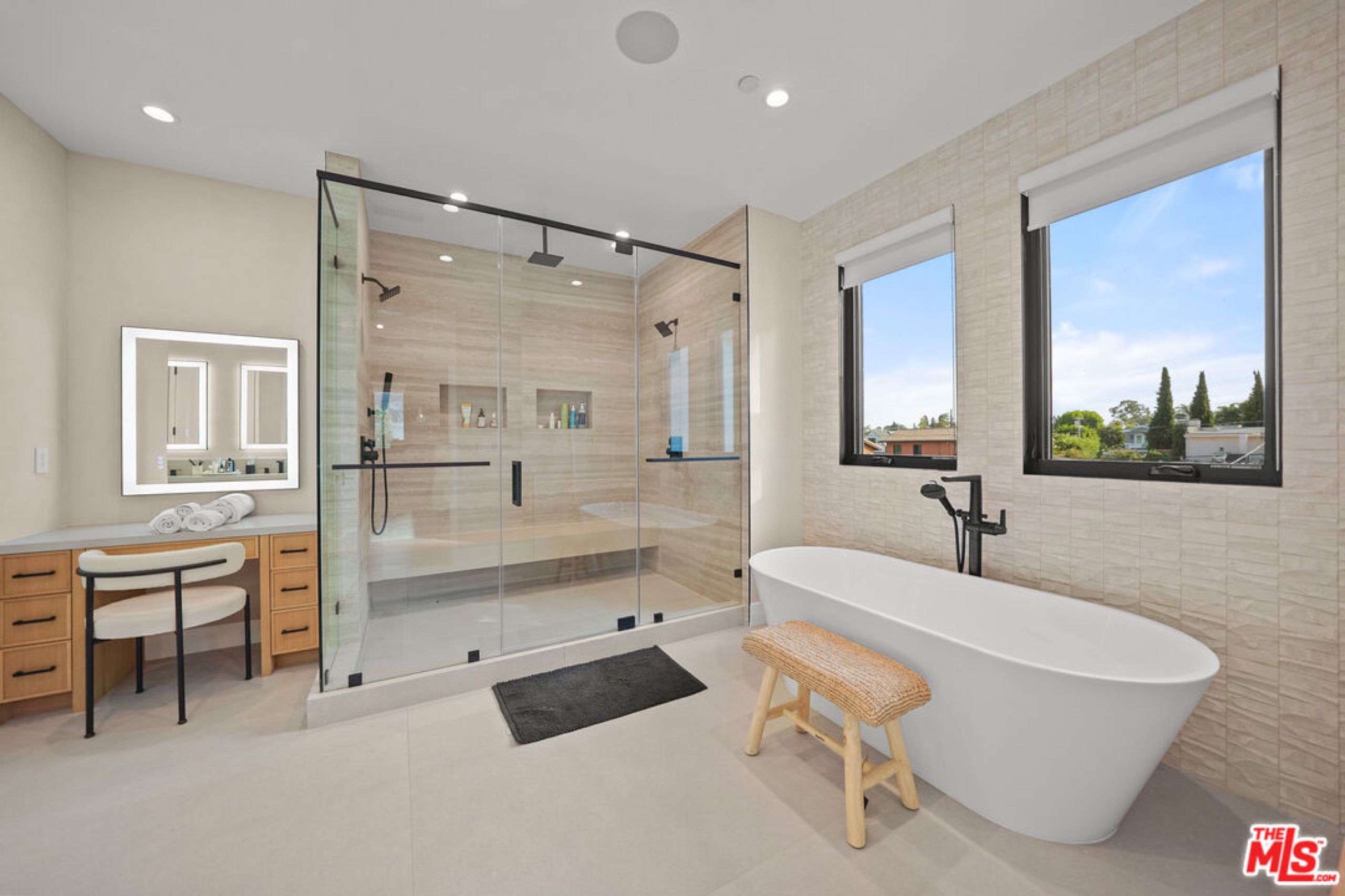 Primary bath with freestanding tub and glass shower