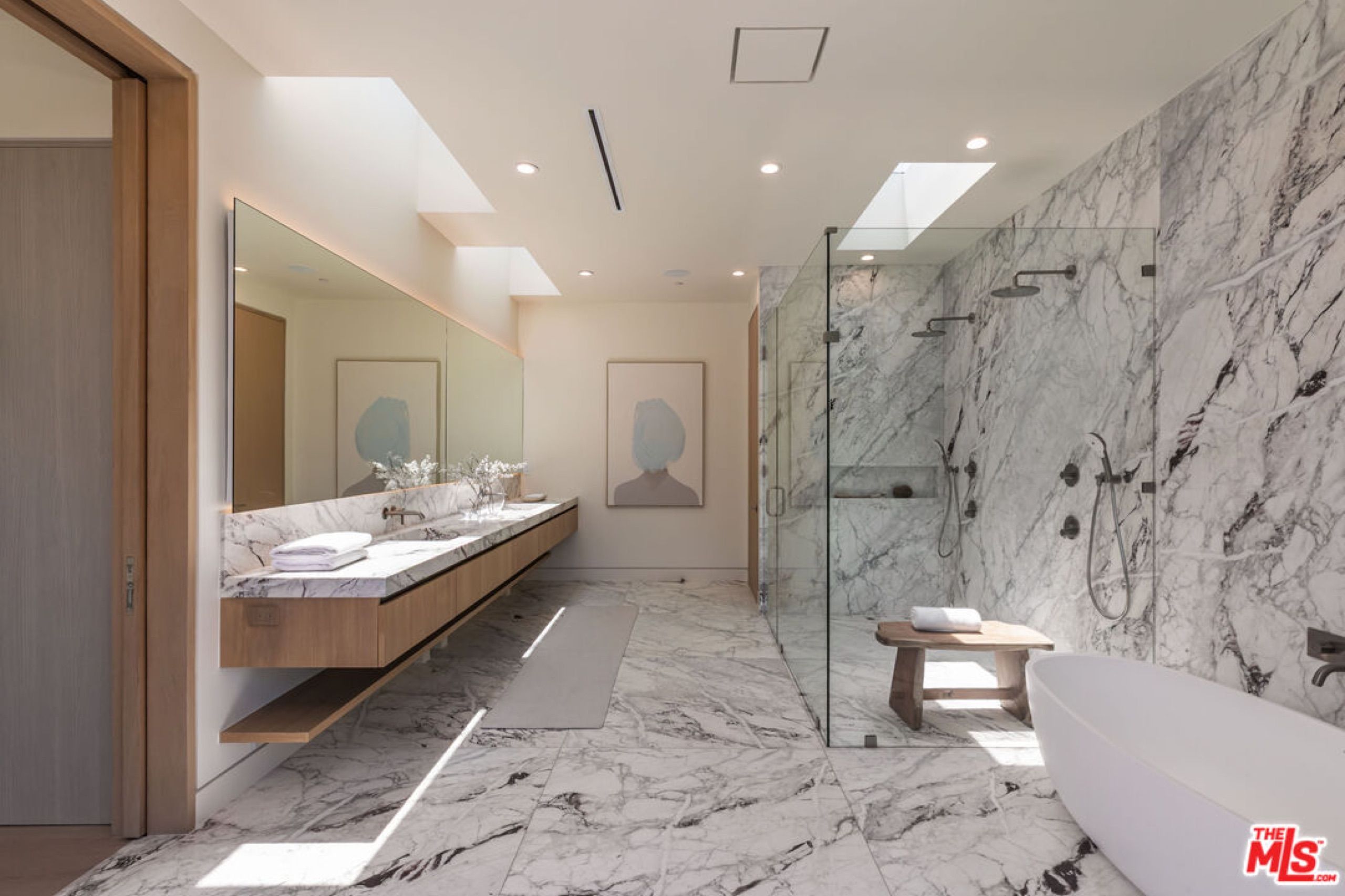 Marble primary bath with freestanding tub and walk in shower