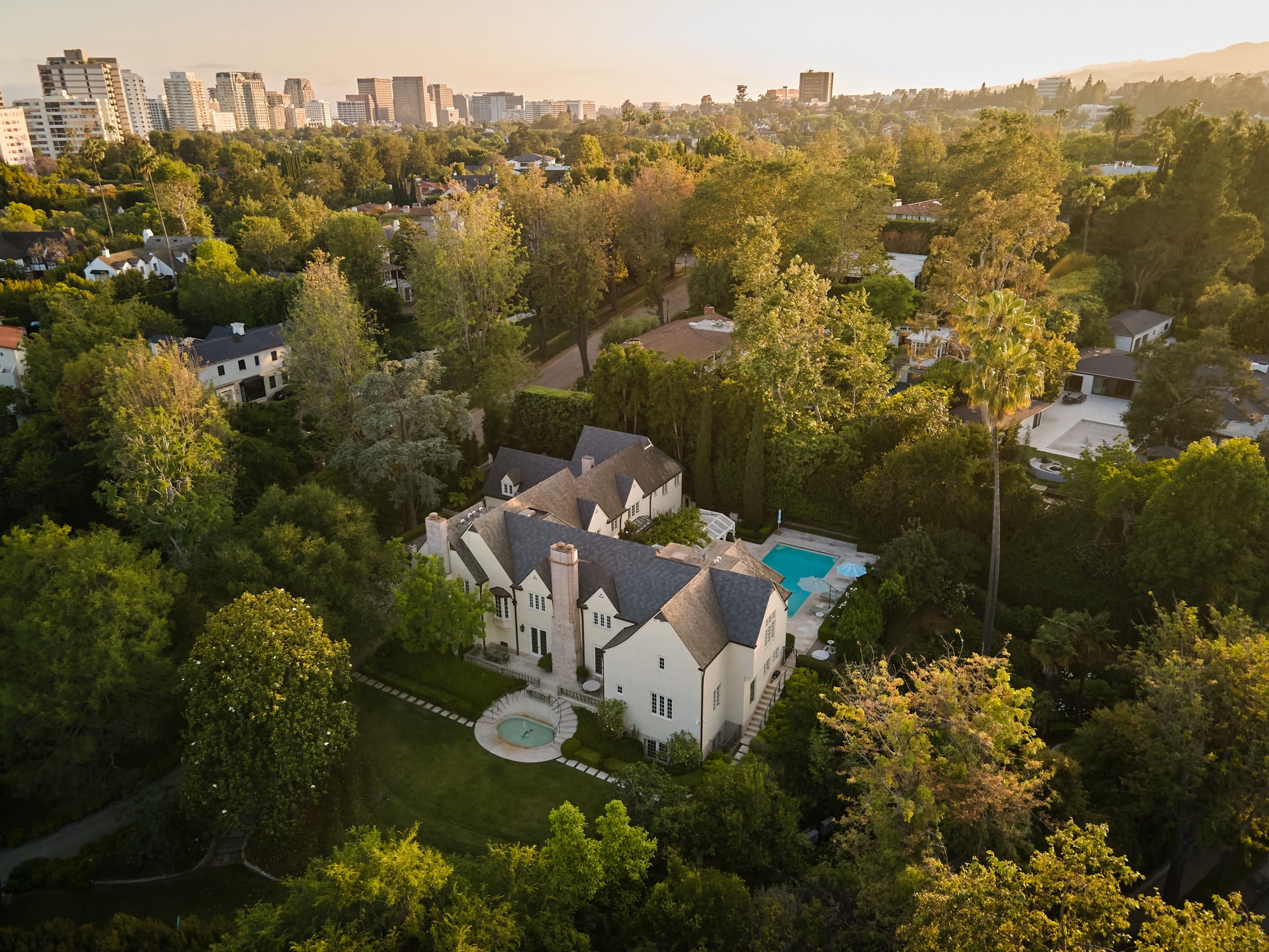 Aerial view of the estate with the Wilshire Corridor skyline beyond
